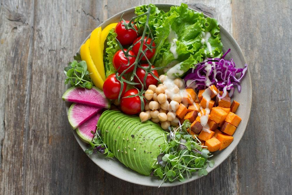 A bowl of vegetables and fruits